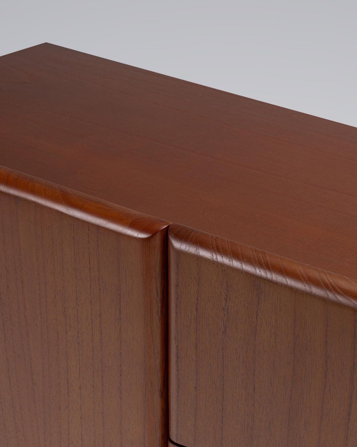 Close-up of a wooden surface with a visible grain pattern.