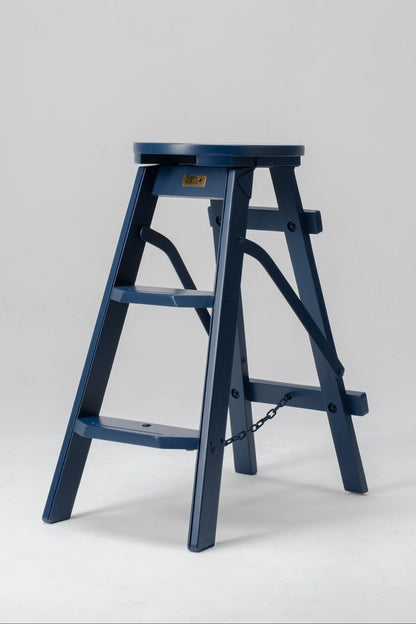 Blue step ladder on a white background