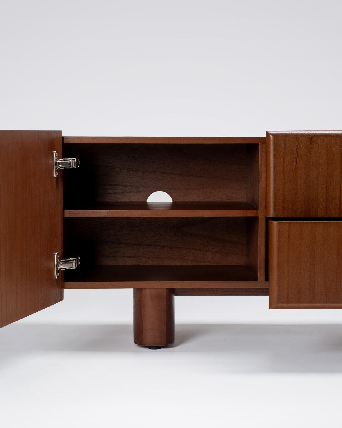 dark entertainment unit with holes for consoles