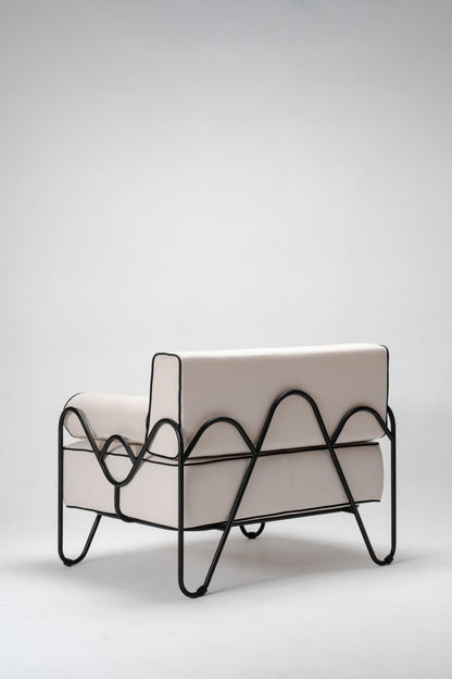 Modern chair with black, powder coated, metal frame and white cushion