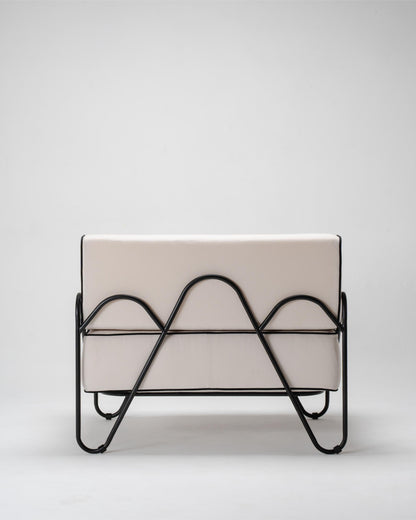 modern outdoor armchair, black metal frame and white cuhsions
