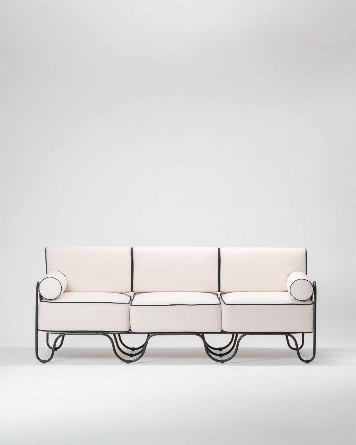 Modern white outdoor sofa with metal frame