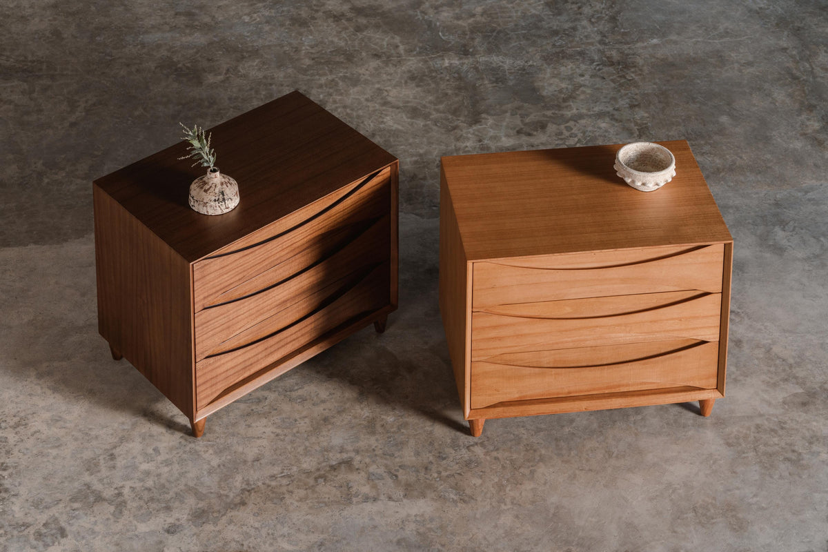 two wide wooden bedside tables