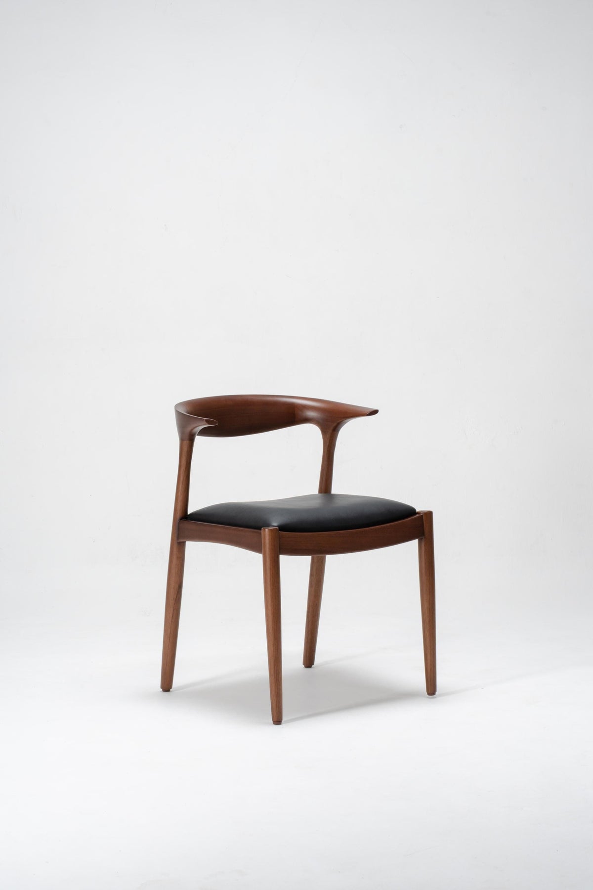 dining chair in wood with black seat