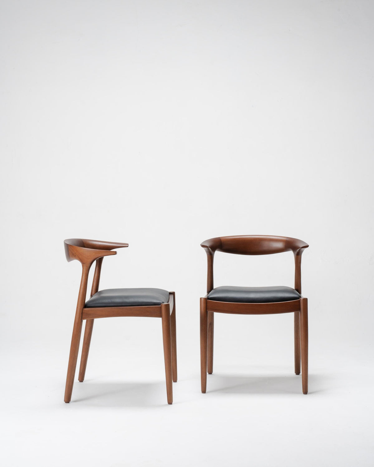 pair black leather dining chairs