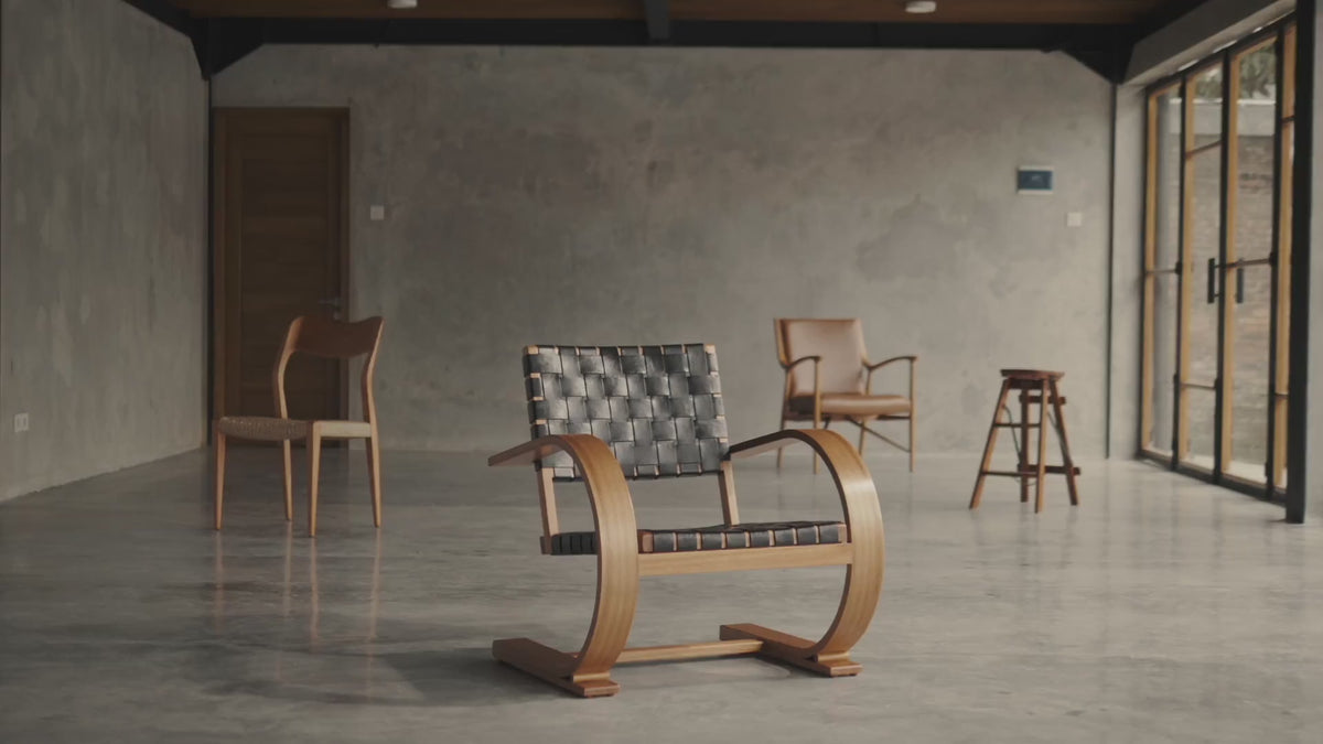French Modernist Armchair - leather black woven arm chairs - Larkwood Furniture