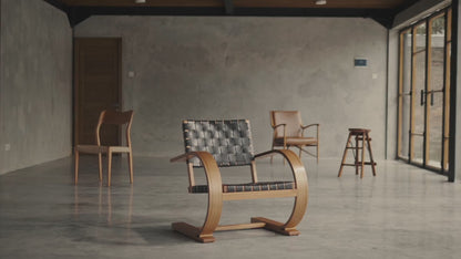 French Modernist Armchair - leather black woven arm chairs - Larkwood Furniture